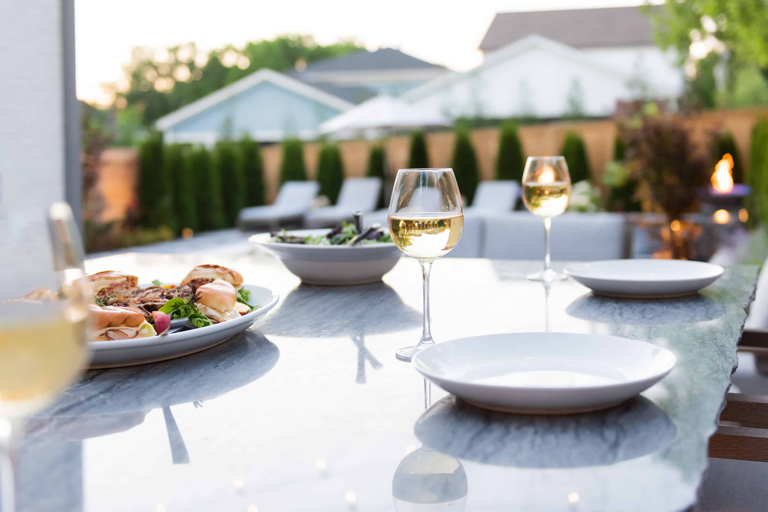 Wine glasses on a patio dinner table